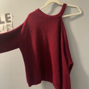 Sweater with cutout shoulder